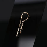 14k GOLD CLAW RING WITH TINY BARREL