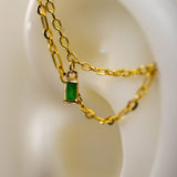 14k GOLD DOUBLE EAR CHAIN - EMERALD BAGUETTE